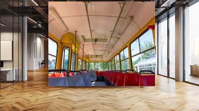 Empty cabin of an old tram without passengers. Wall mural