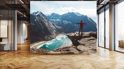 Man stand on cliff edge alone enjoying aerial view backpacking lifestyle travel adventure outdoor vacations Wall mural