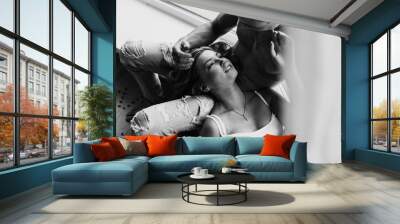 black and white photo of happy morning of Young romantic couple in love have fun, kissing and hugs. Love and relationships lifestyle. Wall mural