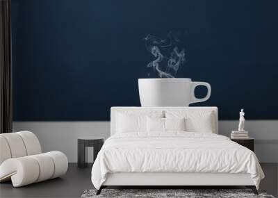 cup of tea with steam. hot tea in a white circle. cups of hot coffee on blue background Wall mural