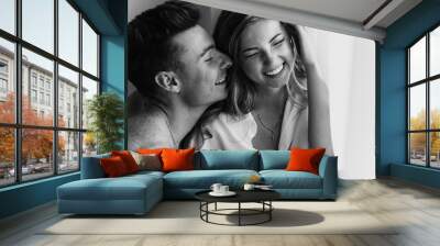 happy young loving couple smiling. Young couple in love have fun i on new years eve or st valentines day. black and white photo of young couple Wall mural