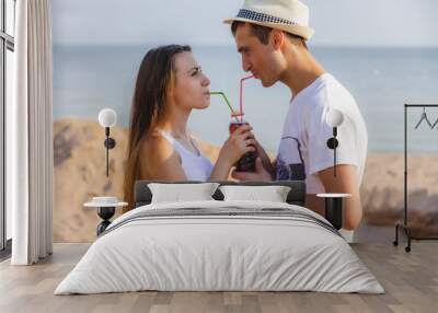 Happy couple at the sea. Wall mural