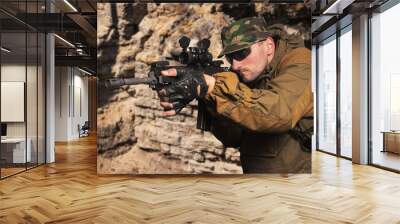 portrait of the soldier with an automatic assault rifle Wall mural