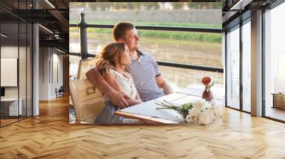 young couple in an open air cafe Wall mural