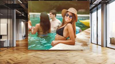 young girls in pool Wall mural