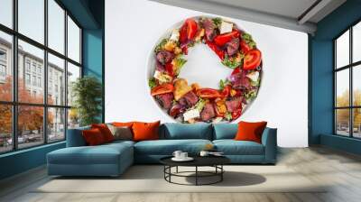 Vegetable salad with veal on a white plate Wall mural