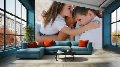 Close up view of happy family hugging. Concept of harmony family. Wall mural