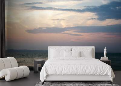  Couple standing on the beach at sunset ocean horizon Wall mural