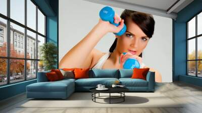 Girl with dumbbells Wall mural