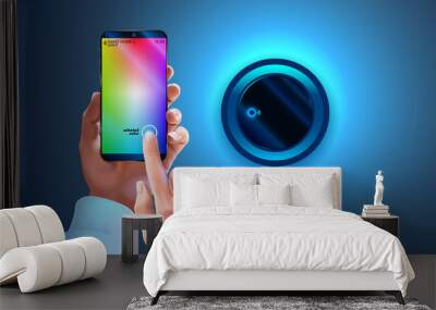 Hue app on phone used to control smart lamp in smart home system. Hands holding smartphone, changing color light wall lapm. Wi-fi remote bulb light. Smart phone connection with wireless lamp via wi-fi Wall mural