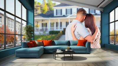 Affectionate Military Couple Looking at Beautiful New House Wall mural