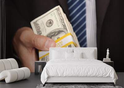 Businessman Handing Over Stack of Cash Wall mural