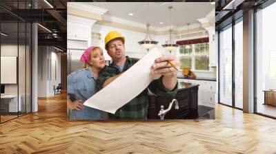 Contractor Discussing Plans with Woman Inside Custom Kitchen Int Wall mural