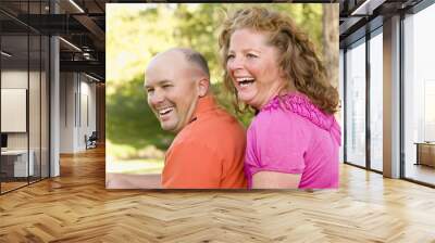 Happy Attractive Couple Laughing in Park Wall mural