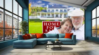 Happy Senior Couple Front of For Sale Sign and House Wall mural