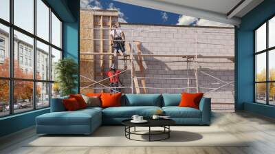 hard working construction workers at a construction scene. Wall mural