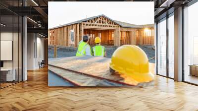 Male and Female Construction Workers at New Home Site Wall mural