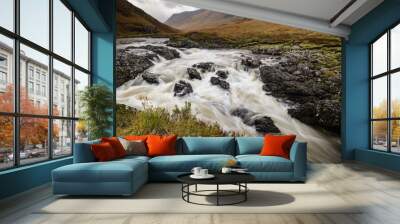 long exposure shot of the waterfalls in glen etive near loch etive and the entrance to glencoe and rannoch moor in the argyll region of the highlands of scotland during autumn Wall mural