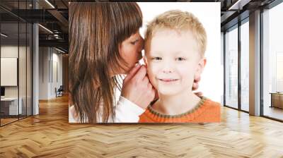 mother and son whispering Wall mural