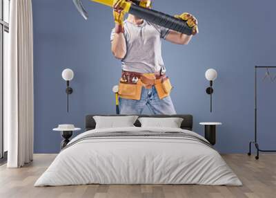 construction worker with a tool belt and a hammer Wall mural