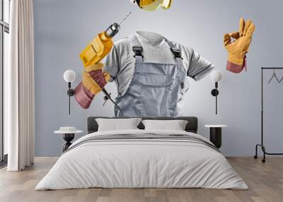 invisible worker in helmet with drill Wall mural