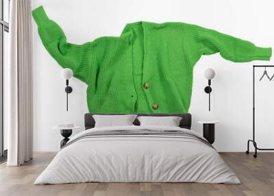 Green knitted sweater with buttons, laid out as if levitating , isolate Wall mural