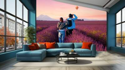 Asian couple travel in lavender field Wall mural