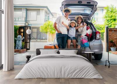 Asian Family going to holiday on summer vacation before start from home Wall mural