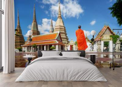 Buddhism Monk walk in Pho temple in Bangkok city Wall mural