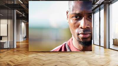 Black man, athlete and face with focus, sport and fitness outdoor with mockup space, sweat and determined. Portrait, exercise and sports with training, mindset and motivation with workout in Jamaica Wall mural