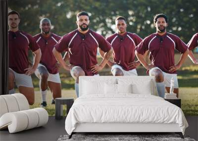 Rugby, racial activism or team take a knee in solidarity or support for a match, game or sports match. Men, fitness or group of male athletes in unity against inequality or global racism on grass Wall mural