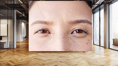 Woman, freckles and portrait of natural eyes closeup with thinking and idea facial expression. Young girl with bare face, beauty and healthy skin spots and brown iris for skincare campaign. Wall mural