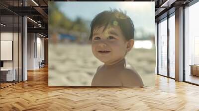 Portrait of a cute asian baby boy on the beach. Wall mural