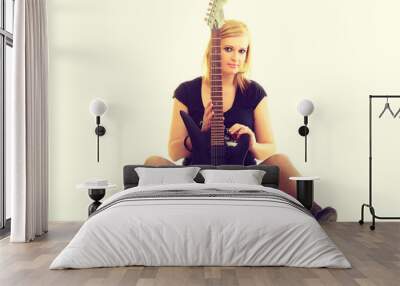 Blonde girl with electric guitar. Wall mural