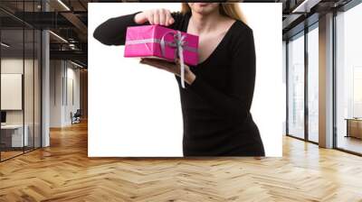 Girl opening pink gift box Wall mural