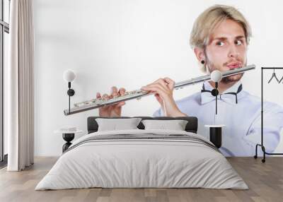 Male flutist playing his flute Wall mural