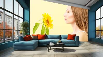 portrait attractive woman with sunflower Wall mural