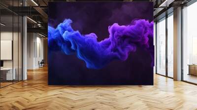 A vibrant mix of purple and blue smoke swirls gracefully in the air, forming intricate patterns against a deep black backdrop, evoking a sense of tranquility and creativity Wall mural