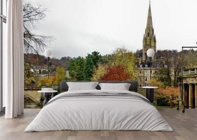 georgian architecture surrounded by autumn foliage, on the bank of the river avon in bath, england Wall mural