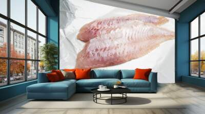 Two fresh redfish fillets on white wrapping paper Wall mural