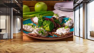 a plate of healthy bread snack with vegetables Wall mural