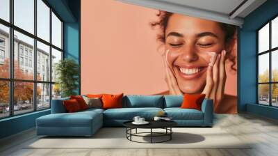 a beautiful woman washing her face. skincare concept. Wall mural