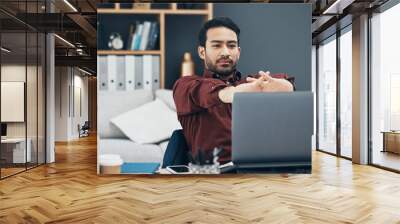 Laptop, working and man stretching fingers for carpal tunnel, muscle health or self care with work from home job. Business asian person or worker on computer and hands stretch to prepare for tasks Wall mural