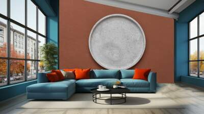 Gray ceramic plate isolated on white background. Wall mural