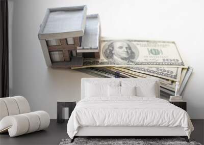 House model on 100 US dollar bills. Keep money or investment for building a new house Wall mural