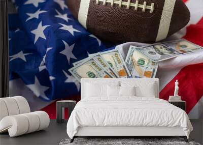 Money and rugby ball on american flag background, closeup. Concept of sports bet Wall mural