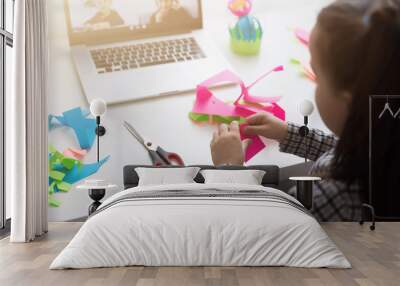 Pretty stylish schoolgirl studying homework math during her online lesson at home, social distance during quarantine, self-isolation, online education concept, home schooler Wall mural