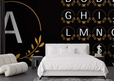 Golden leaf wreath logo with the alphabet Wall mural