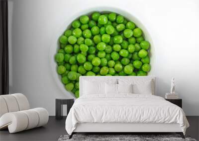 green peas on white bowl on white background. Wall mural