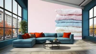 Fresh stack of light pastel colorful cotton and linen fabrics, freshness concept. Eco-laundry template. Generative AI Wall mural